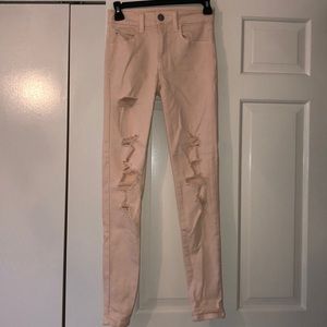 American Eagle light pink ripped jeans